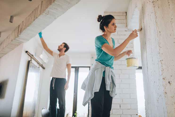 People painting a room